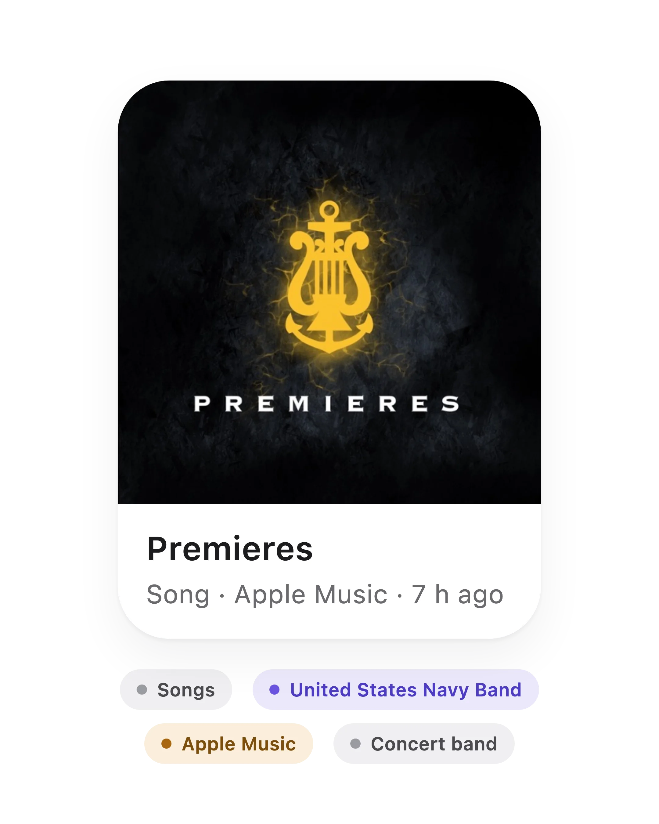 Premieres as a card, Song · Apple Music · 7 h ago, with its four tags as chips: Songs, United States Navy Band, Apple Music and Concert band.